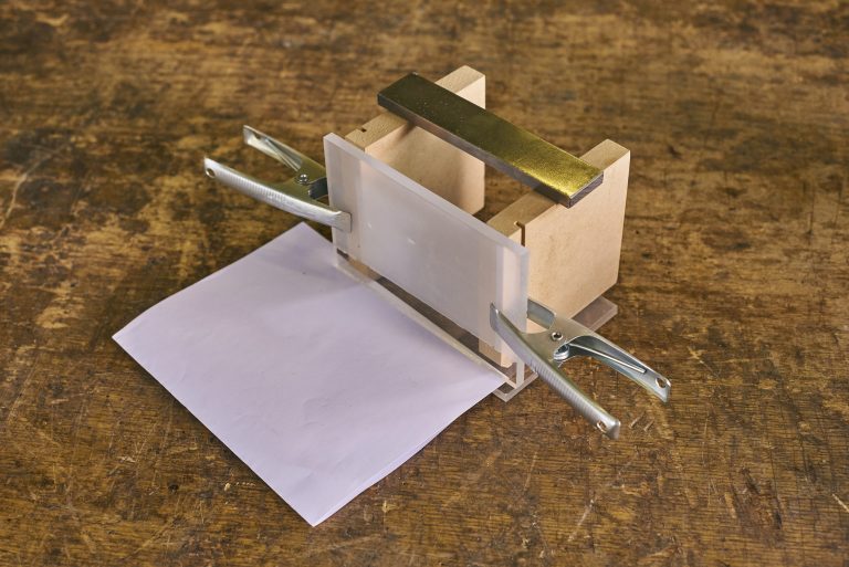 Afbeelding met gereedschap, papier, Papierprodcut, origamiDoor AI gegenereerde inhoud is mogelijk onjuist.